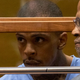 Eric Holder, charged with murder in the death of Nipsey Hussle, seen with his now-former defense attorney Christopher Darden